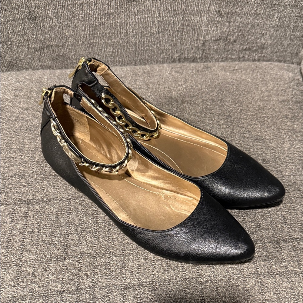BCBGeneration Black Flats with Gold Chain Accent